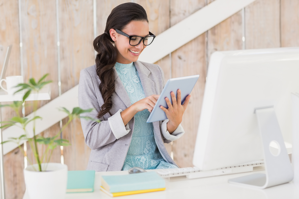 stylist brunette working from home office